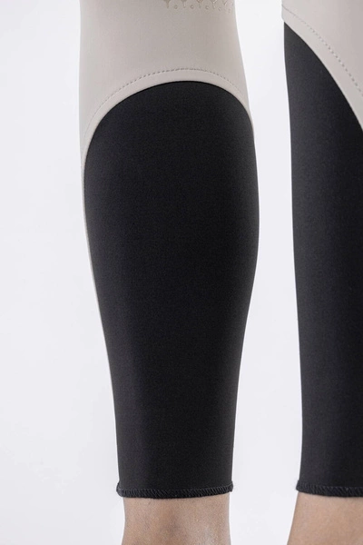 Damskie bryczesy Equiline Atirk z kolanowym lejem X-Grip - beżowe