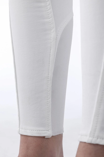 Dziecięce bryczesy Equiline Jaklink - białe