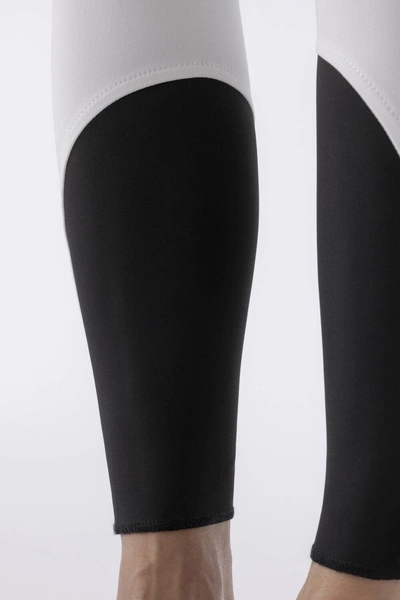 Damskie bryczesy Equiline Ash z lejem kolanowym - białe