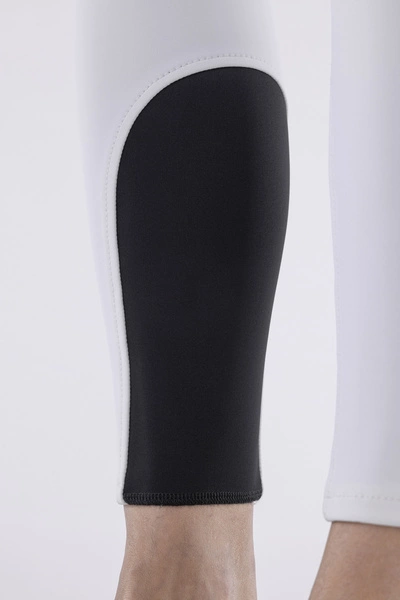 Damskie bryczesy Equiline Cornek z lejem kolanowym BX-TECH - białe